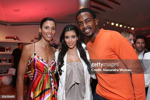 Kristen Baker, Kim Kardashian, and Bill Bellamy at The Launch Party for the New Pink BlackBerry Curve from Verizon Wireless held at Intermix on...
