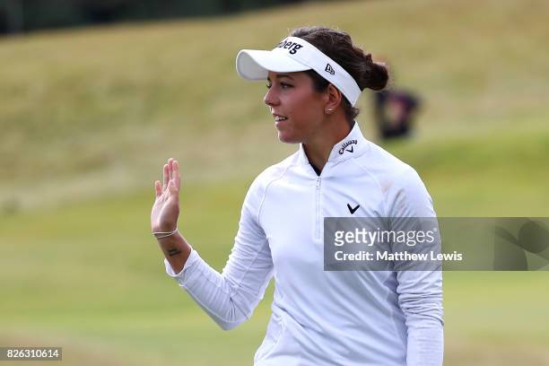 Georgia Hall of England acknowledges the crowd on the 15th green during the second round of the Ricoh Women's British Open at Kingsbarns Golf Links...