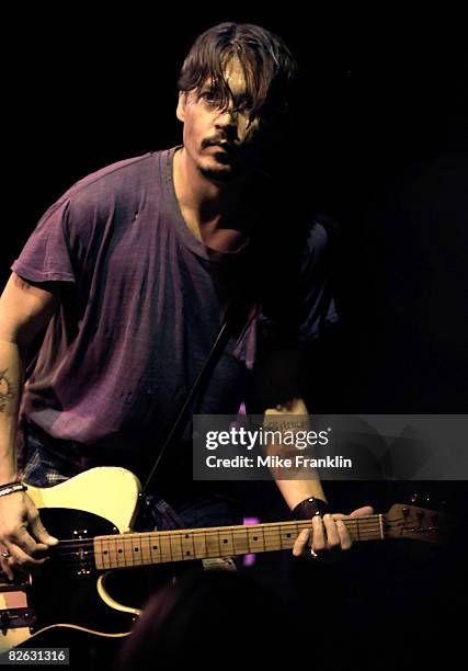 Johnny Depp performs live with his band The Kids as part of the Sheila Witkin Memorial Reunion Concert at Club Cinema on August 28, 2008 in Pompano...