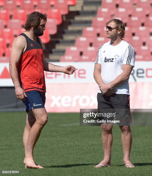 Captain Sam Whitelock of the Crusaders and Coach Scott Robertson of the Crusaders during the BNZ Crusaders stadium walk-over and kicking practice at...