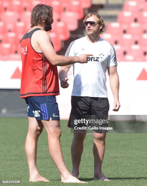 Captain Sam Whitelock of the Crusaders and Coach Scott Robertson of the Crusaders during the BNZ Crusaders stadium walk-over and kicking practice at...