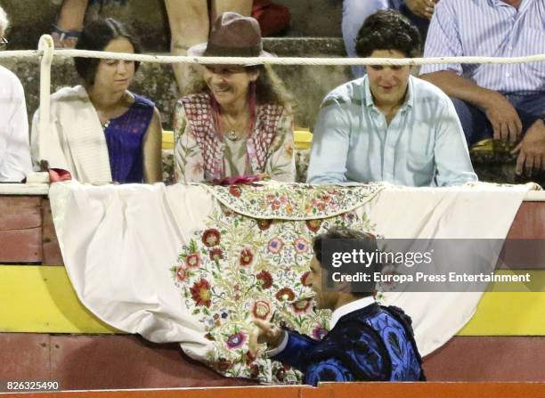 Princess Elena of Spain and her children Felipe Juan Froilan de Marichalar y Borbon and Victoria Federica de Marichalar y Borbon attend Spanish...