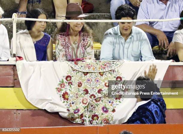 Princess Elena of Spain and her children Felipe Juan Froilan de Marichalar y Borbon and Victoria Federica de Marichalar y Borbon attend Spanish...