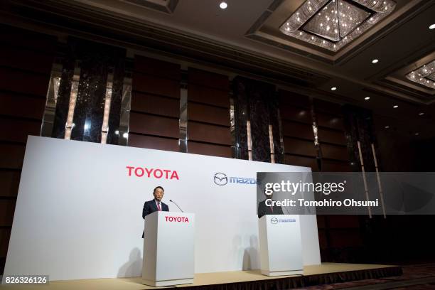 Toyota Motor Co. President Akio Toyoda, left, and Mazda Motor Co. President and CEO Masamichi Kogai attend a joint press conference on August 4, 2017...