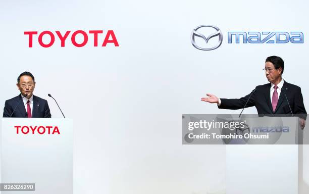 Toyota Motor Co. President Akio Toyoda, left, and Mazda Motor Co. President and CEO Masamichi Kogai attend a joint press conference on August 4, 2017...