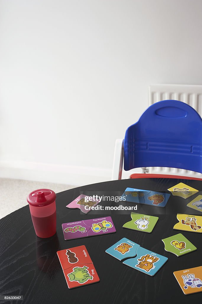 High chair at table with childs jigsaw puzzle