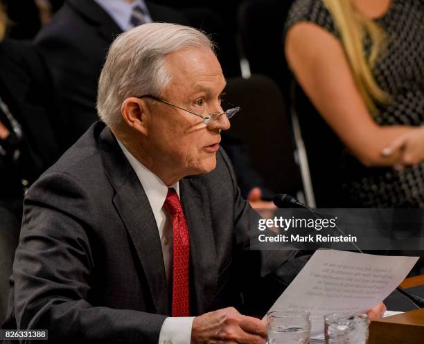 Attorney General Jeff Sessions reads an opening statement as he testifies before the Senate Intelligence Committee, Washington DC, June 13, 2017.