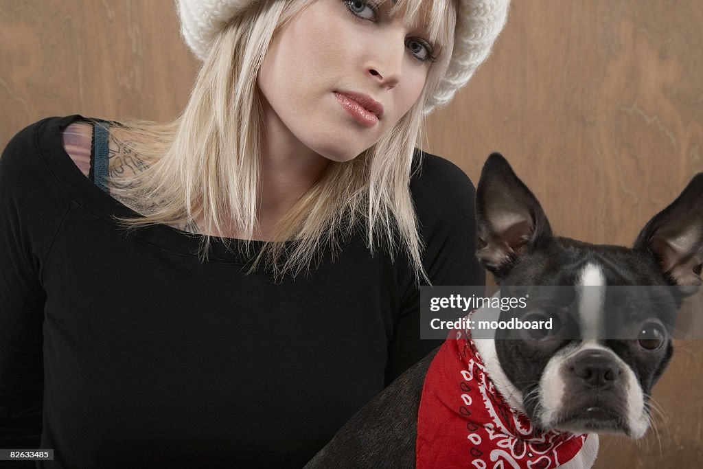 Young woman with French Bulldog, portrait, close-up