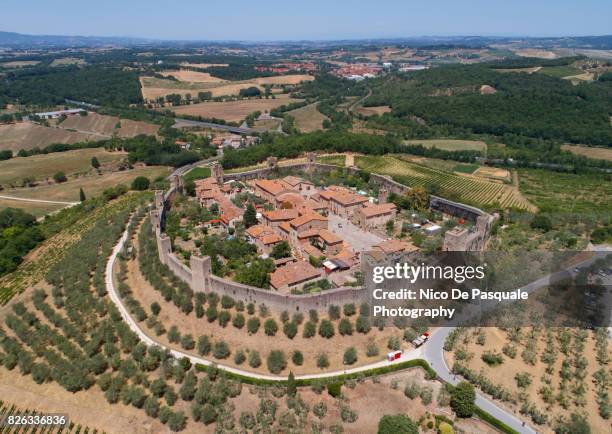 aerial drone view of monteriggioni town - pienza stockfoto's en -beelden