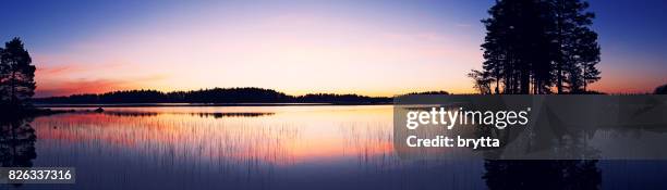 spectacular sunrise over the lake in gastrikland,sweden - gastrikland stock pictures, royalty-free photos & images