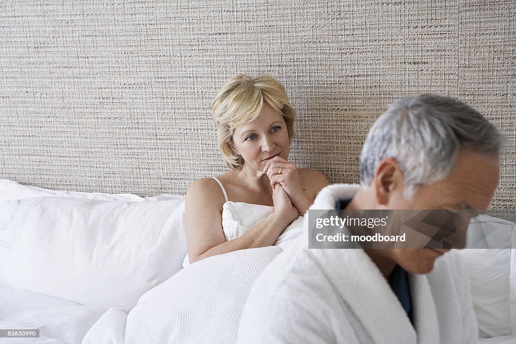 Middle-aged couple in bedroom