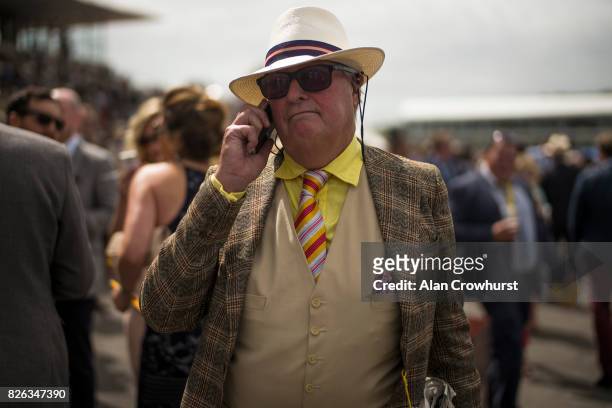 General view of a racegoer on day four of the Qatar Goodwood Festival at Goodwood racecourse on August 4, 2017 in Chichester, England.