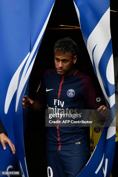 Brazilian superstar Neymar arrives wearing his new jersey during his official presentation at the Parc des Princes stadium on August 4, 2017 in...