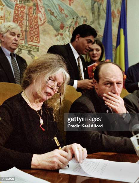 Bridgitte Bardot signs an agreement with Traian Basescu, the mayor of Bucharest March 1, 2001 in Romania regarding the government's plans to reduce...