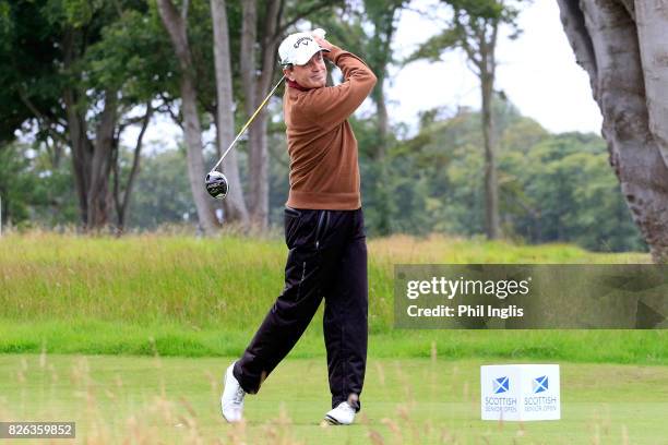 Mark McNulty of Ireland in action on the 8th hole during the first round of the Scottish Senior Open at The Renaissance Club on August 4, 2017 in...