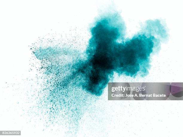 forms and textures of an explosion of a powder of color blue on a  white background - colour powder explosion stock pictures, royalty-free photos & images