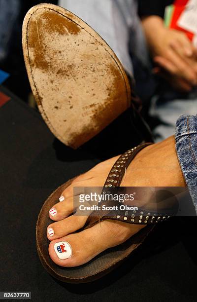The toes of Adryana Boyne from Highland Village, Texas are shown painted with the Republican elephant logo on day two of the Republican National...
