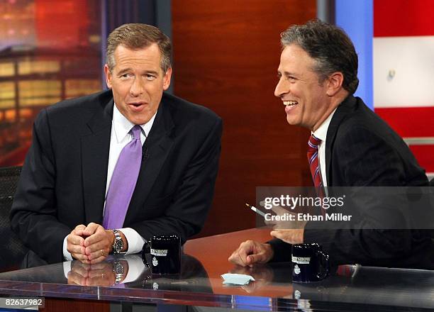 News anchor Brian Williams is interviewed by host Jon Stewart of Comedy Central's "The Daily Show with Jon Stewart" during a taping of "The Daily...
