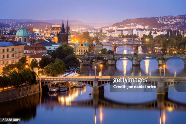 blue hour, bridges, vltava river, prague, czechia - czech republic imagens e fotografias de stock