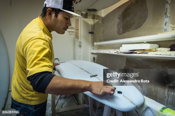 Milano, Italy. Antonio Aguirre, surf boards shaper, chase the summer living between Italy and Perù.