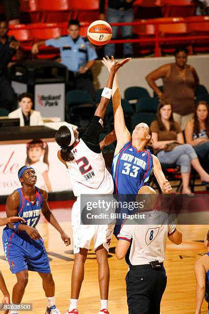 Cathrine Kraayeveld of the New York Liberty and Michelle Snow of the Houston Comets jump for the ball at Reliant Arena on September 2, 2008 in...