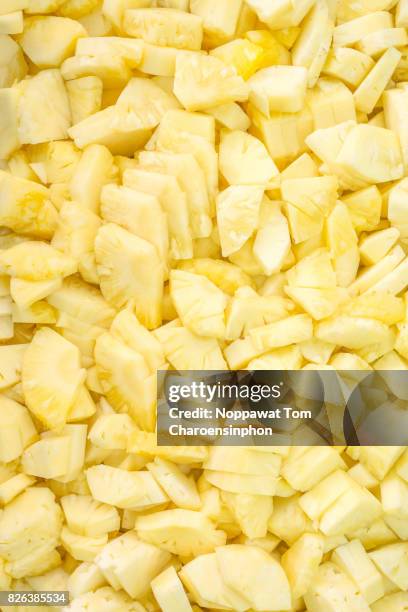pineapple pieces, thailand - ananas aufgeschnitten stock-fotos und bilder
