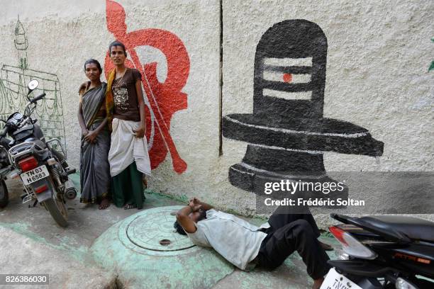 Eunuchs in front of mural painting in the streets of Chennai on January 20, 2017 in Chennai , India.