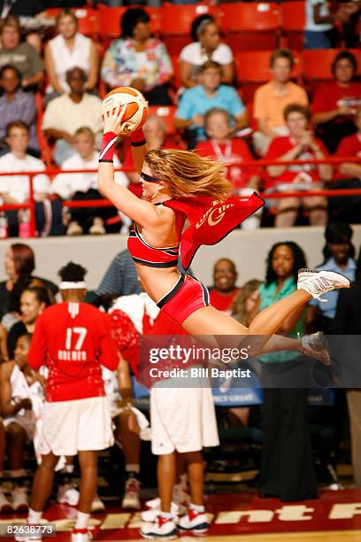 Comet Girl of the Houston Comets dunks the ball at Reliant Arena on September 2, 2008 in Houston, Texas. NOTE TO USER: User expressly acknowledges...