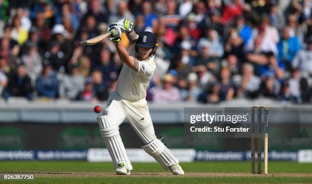 England batsman Ben Stokes drives a ball to the boundary during day one of the 4th Investec Test match between England and South Africa at Old...