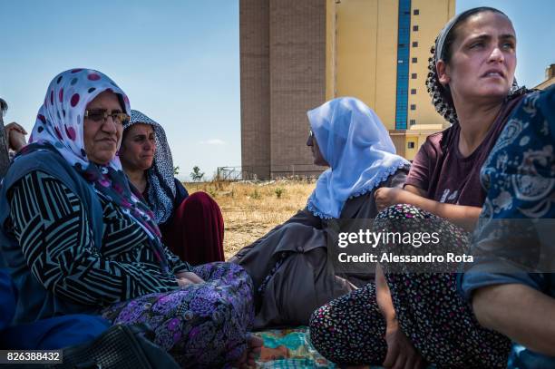 June 2015 - Diyarbakir, Turkey. Hanim Kaya mother of Mutlu Kaya and her sister Dilek Kaya receive daily visits from members of the family at their...