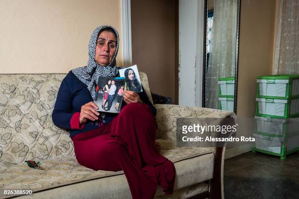 June 2015 - Ergani, Turkey. Hanim Kaya mother of Mutlu Kaya poses for a portrait in the house where Mutlu was shot in the head on the night of the...