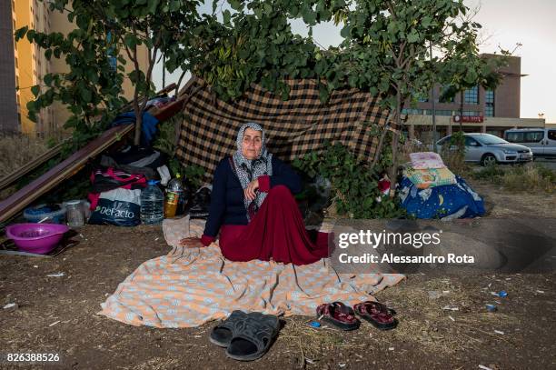 June 2015 - Ergani, Turkey. Hanim Kaya mother of Mutlu Kaya poses for a portrait in the house where Mutlu was shot in the head on the night of the...