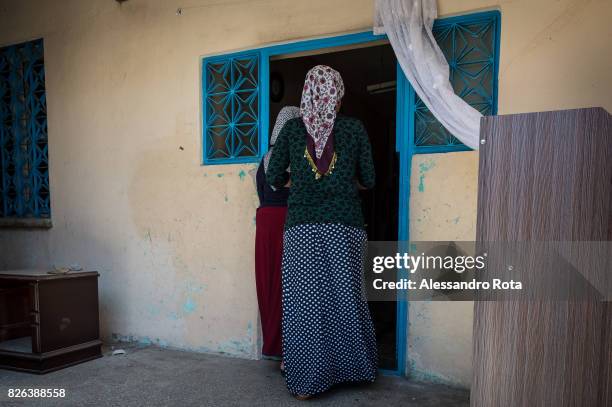 June 2015 - Diyarbakir, Turkey. Hanim Kaya mother of Mutlu Kaya receives daily visits from members of the family in the riceve visite giornaliere da...