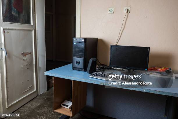 June 2015 - Ergani, Turkey. Hanim Kaya mother of Mutlu Kaya remembers moments of joy with her daughter in the house where Mutlu was shot in the head...