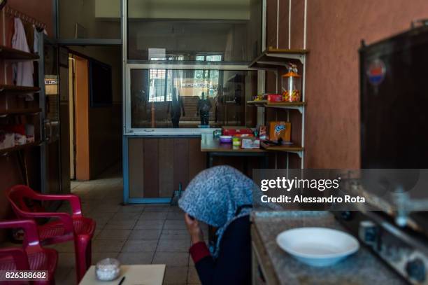 June 2015 - Ergani, Turkey. Hanim Kaya mother of Mutlu Kaya in the cafeteria of the school where her daughter was working. She shot in the head on...