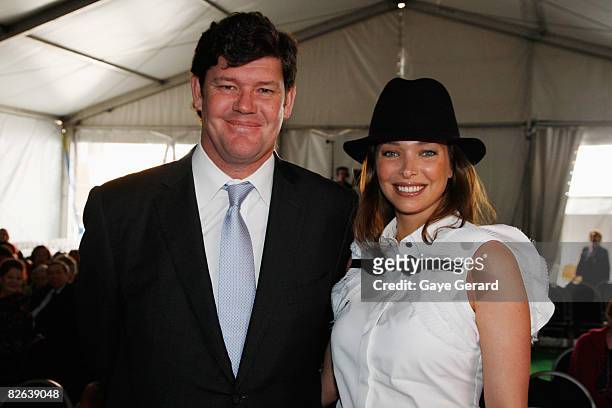 James Packer and Wife Erica Baxter pose at the ceremony as Crown Princess Mary of Denmark makes a presentation onstage as she opens the new Victor...