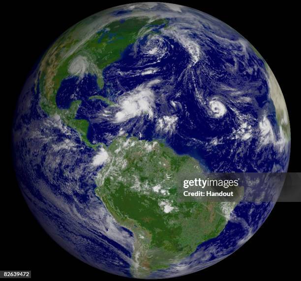 In this satellite image provided by the National Oceanic and Atmospheric Administration , storm systems Gustav, Hanna, Ike and Josephine are seen on...