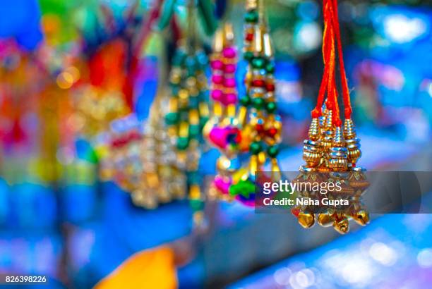 indian street market on raksha bandhan - raksha bandhan stock-fotos und bilder
