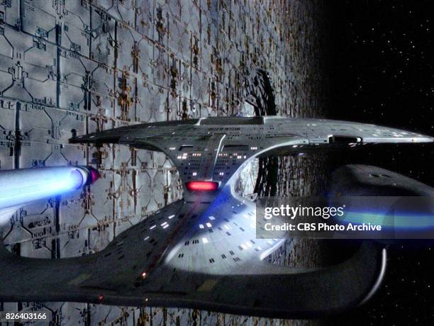 Star Trek: The Next Generation episode 'Relics' originally broadcast October 12, 1992. The starship Enterprise along side a Dyson sphere. Image is a...