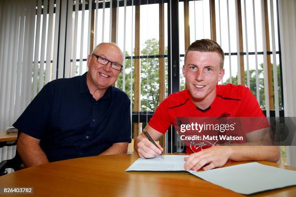 Southampton FC's Matt Targett signs a new five year contract with the club, pictured with Vice Chairman Les Reed at the Staplewood Campus on August...