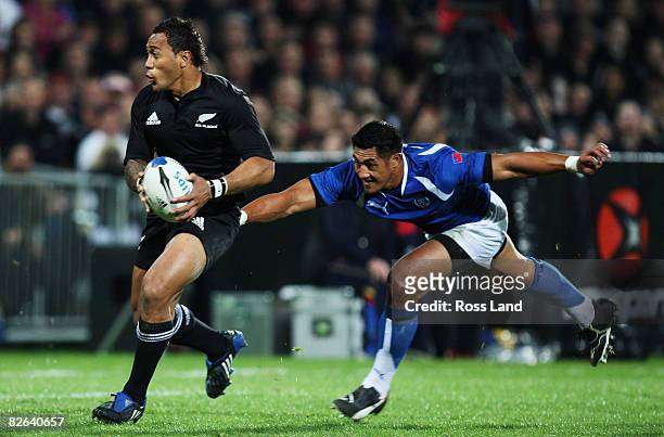 Anthony Tuitavake of the All Blacks and Alafoti Faosiliva of Samoa in action during the rugby test match between New Zealand and Samoa at Yarrows...