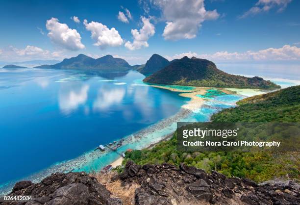 beautiful view from the top of bohey dulang island - mountain peak above clouds stock pictures, royalty-free photos & images