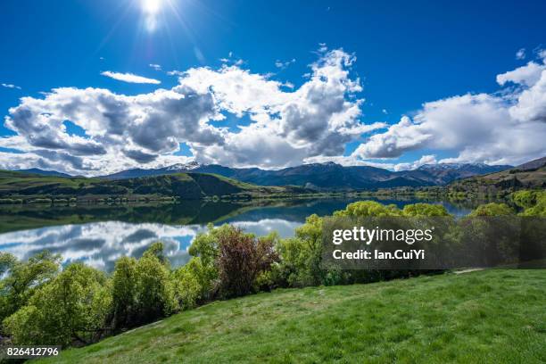 lake hayes in new zealand - rural new zealand stock pictures, royalty-free photos & images