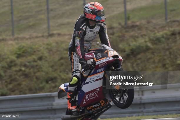 Jakub Kornfeil of Czech Rep. And Peugeot MC Saxoprint lifts the front wheel during the MotoGp of Czech Republic - Free Practice at Brno Circuit on...