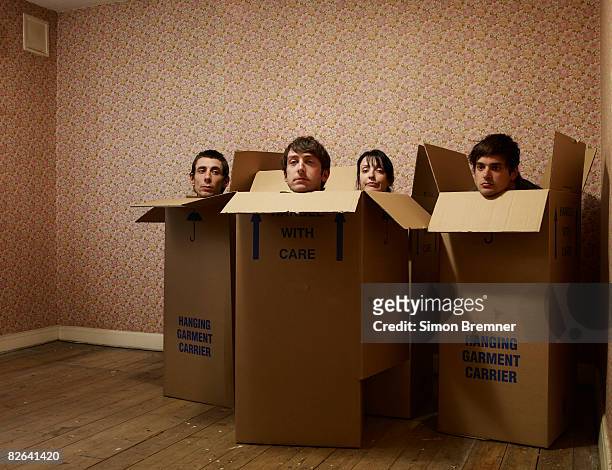 people in boxes - humor stockfoto's en -beelden