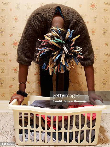 woman with pegs in hair  - eccentric woman stock pictures, royalty-free photos & images