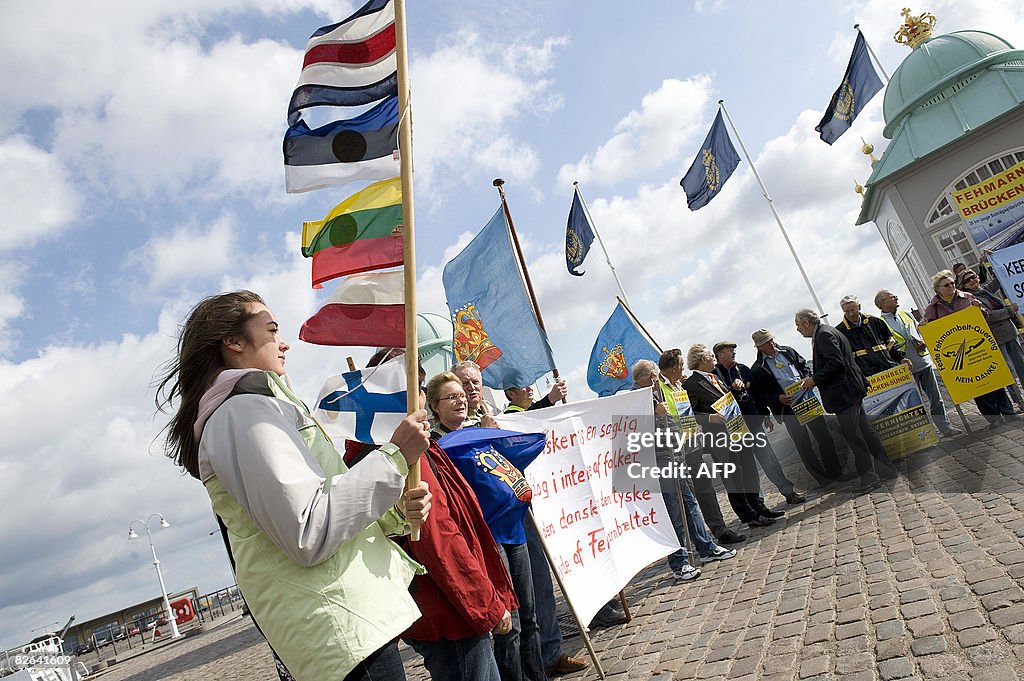 A group of activists gather to protest t