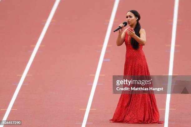 Rebecca Ferguson sings the national anthem of Great Britain during day one of the 16th IAAF World Athletics Championships London 2017 at The London...