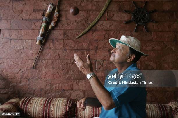 Ajit Wadekar tossing a season ball at his home in Worli.