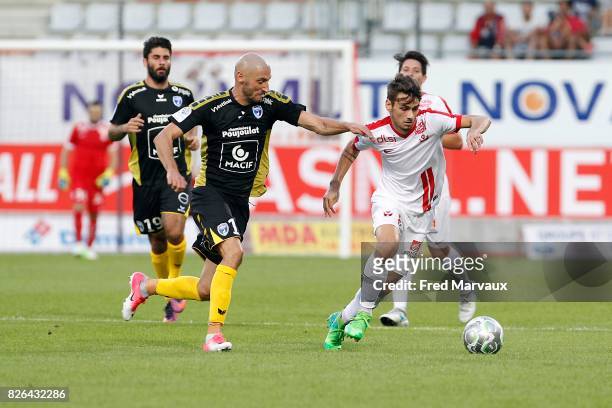 Laurent Agouazi of Niort and Vincent Marchetti of Nancy during the French Ligue 2 match between Nancy and Niort at Stade Marcel Picot on August 4,...